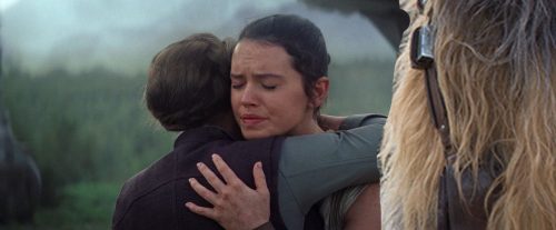 Leia ignores Chewbacca and embraces Chewie.